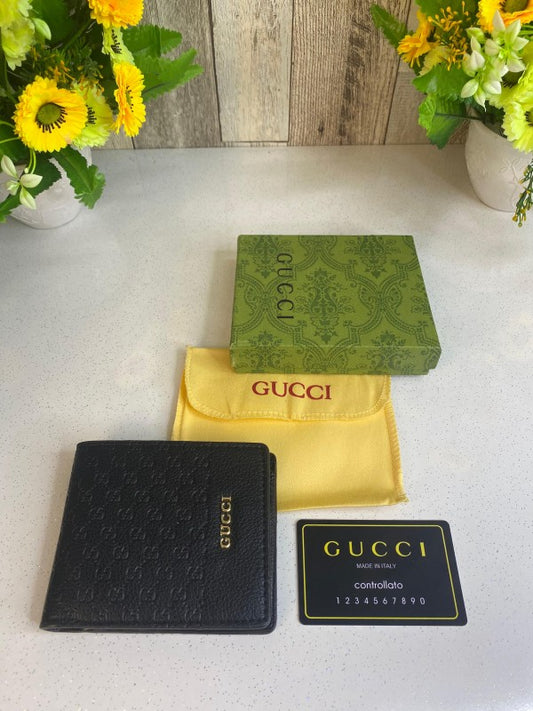 Gucci Embossed Logo Black Flap Wallet